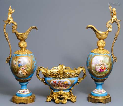 A pair of massive gilt bronze-mounted Sèvres porcelain ewers and a jardinière, France, 19th C.