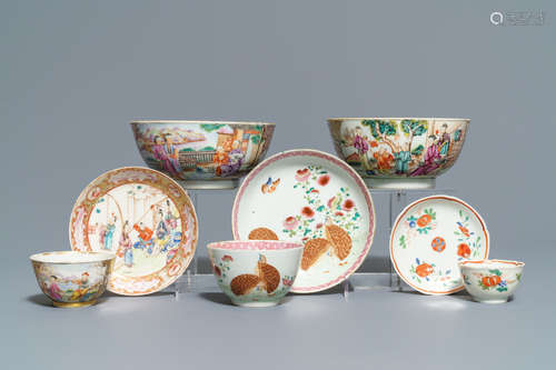 Two Chinese famille rose 'mandarin' bowls and three cups and saucers, Qianlong