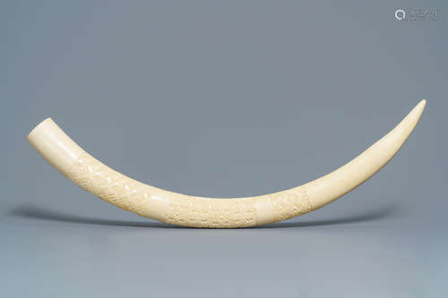 A carved African ivory tusk with ornamental design, Congo, 1st half 20th C.