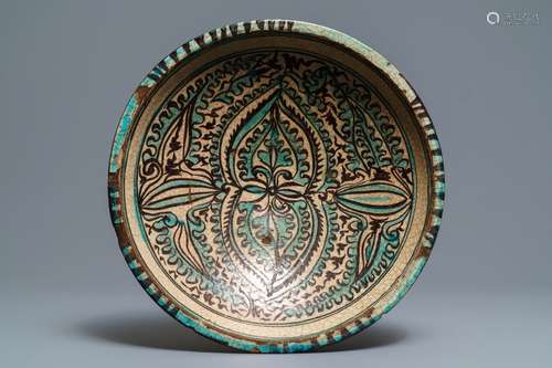 A deep Islamic pottery ornamental dish, Bukhara, Uzbekistan, 17/18th C.