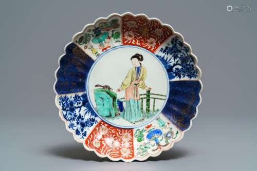 A Chinese verte-Imari 'lady and squirrel' plate, Kangxi