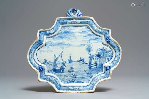 A Dutch Delft blue and white 'maritime scene' plaque, 18th C.