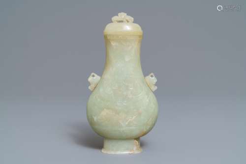 A Chinese archaic celadon jade vase and cover, 19th C.