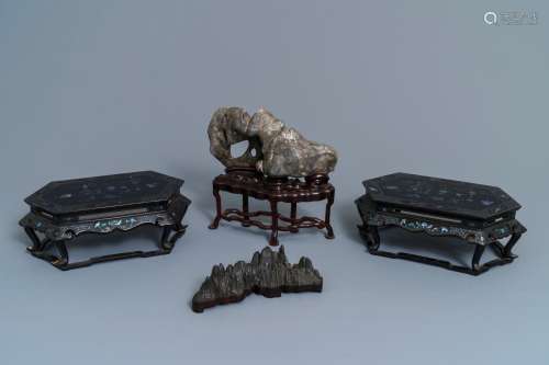 A pair of Chinese mother of pearl and lacquer stands and two scholar rocks, 19/20th C.