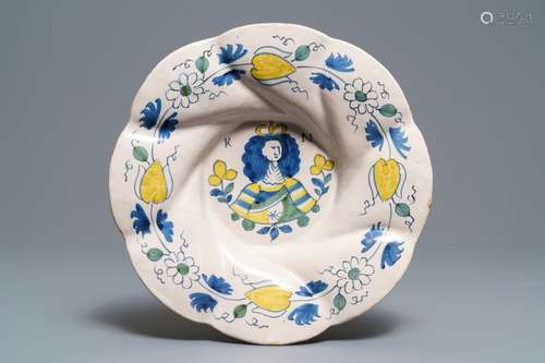 A polychrome Dutch Delft gadrooned 'Queen Mary' dish, 17th C.