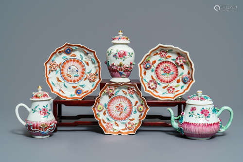 A Chinese famille rose relief-decorated teapot, milk jug and tea caddy on stands, Yongzheng