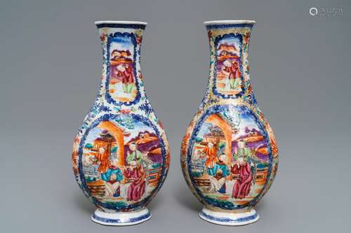 A pair of Chinese famille rose 'mandarin' vases, Qianlong