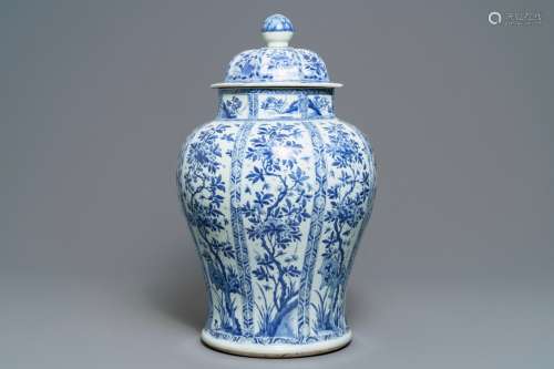 A large Chinese blue and white baluster jar and cover with floral panels, Kangxi