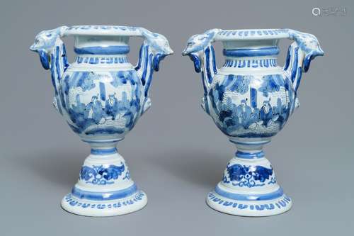 A pair of Dutch Delft blue and white chinoiserie altar vases, 17th C.