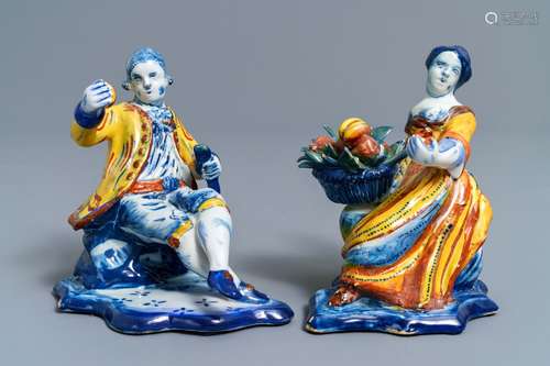 A pair of polychrome Dutch Delft allegorical figures, 18th C.