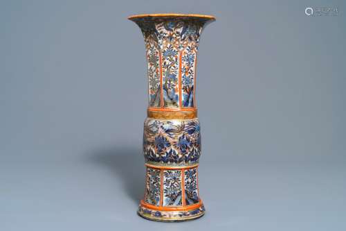 A Chinese blue and white vase with European clobbered decoration, Kangxi