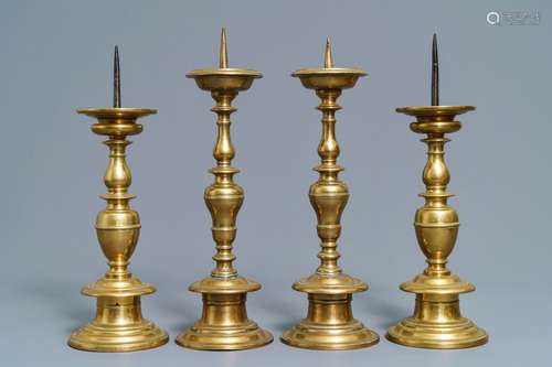 Two pairs of Dutch or Flemish bronze pricket candlesticks, 17th C.