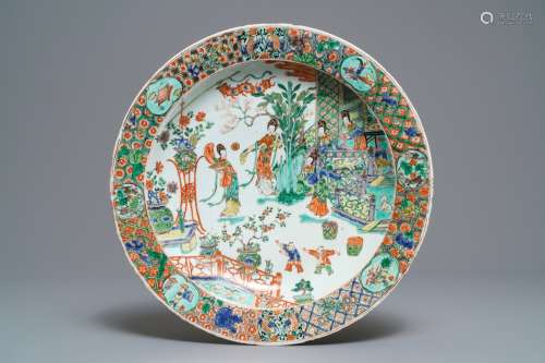 A fine Chinese famille verte dish with ladies in a garden, Kangxi