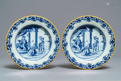 A pair of Dutch Delft blue and white 'Judgment of Solomon' plates, 18th C.