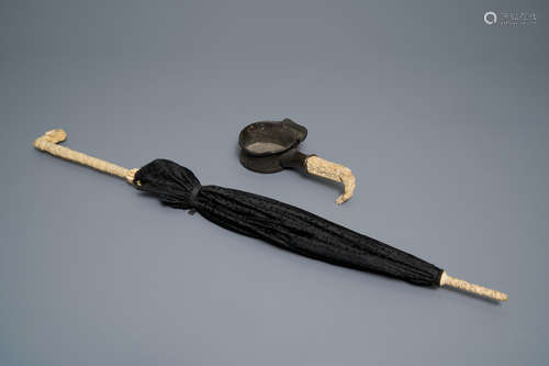 A Chinese carved ivory, bamboo and silk parasol and an bone-handled iron, Canton, 18/19th C.