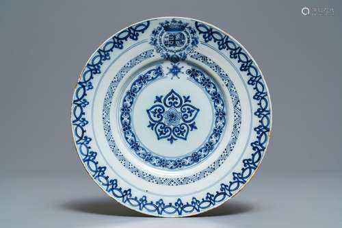 A Dutch Delft blue and white armorial plate, 2nd half 17th C.