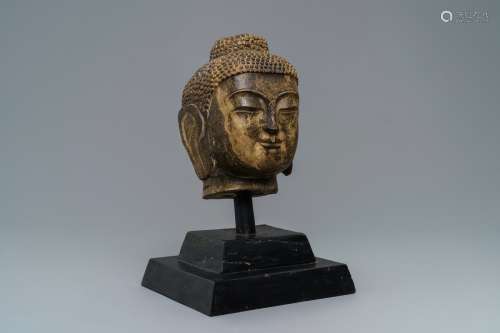 A Chinese carved stone head of Buddha Shakyamuni, Ming or later