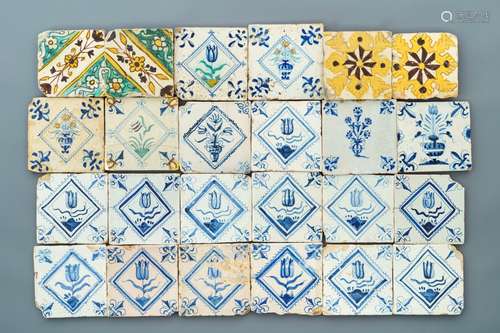 A varied collection of Spanish and Dutch Delft blue, white and polychrome tiles, 17th C.