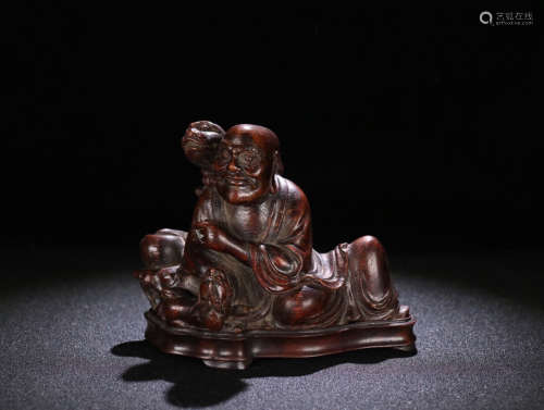 A CHENXIANG WOOD LUOHAN SHAPED ORNAMENT