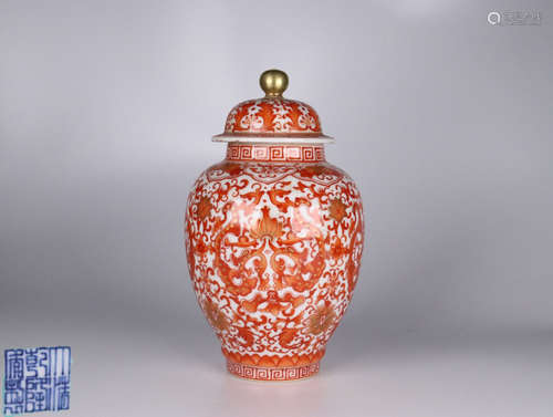 A PORCELAIN JAR WITH RED DRAGON PATTERN