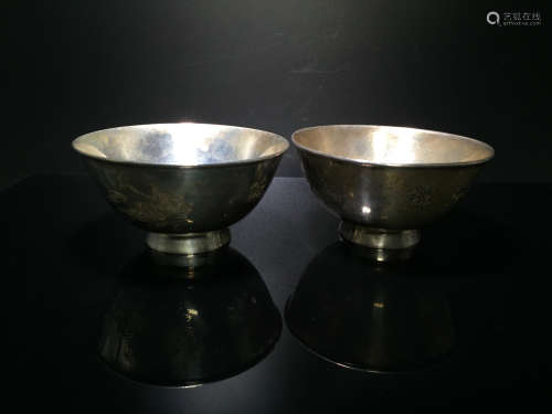 A PAIR OF SILVER BOWLS