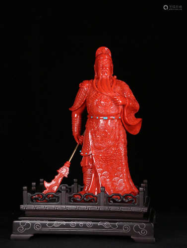 A RED CORAL GUANYU SHAPED ORNAMENT