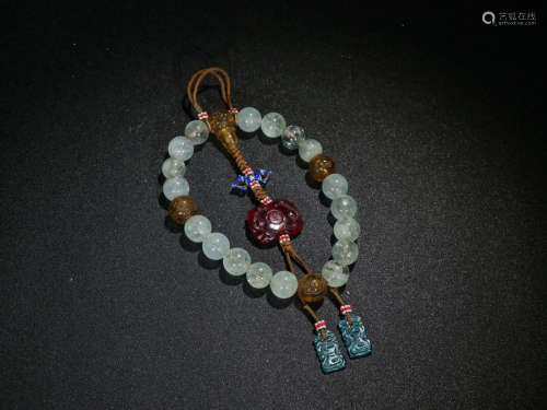 AN OLD CRYSTAL BRACELET WITH 18 BEADS