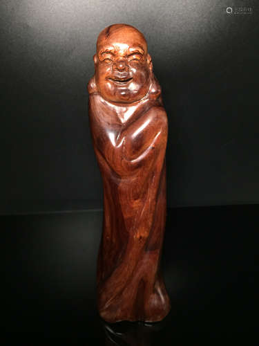 A HUANGHUA WOOD BUDDHA SHAPED ORNAMENT