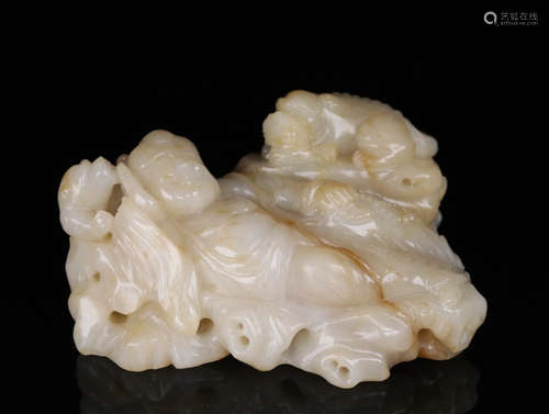 A HETIAN JADE LUOHAN SHAPED ORNAMENT