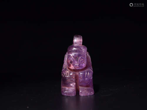 A PURPLE CRYSTAL FIGURE SHAPED ORNAMENT