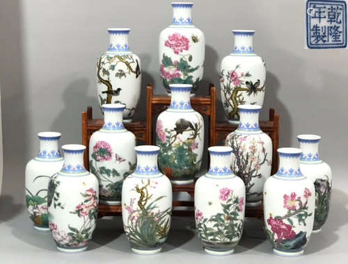 A SET OF ENAMELED PAINTED VARIOUS FLORAL PATTERN 12 BOTTLES