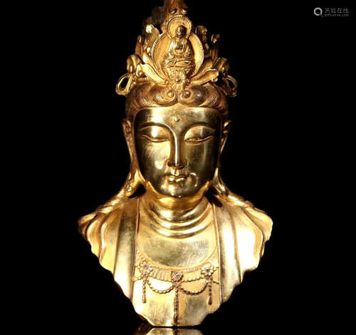 A GILT BRONZE GUANYIN HEAD ORNAMENT