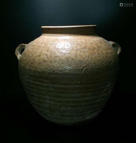 A HAN DYNASTY GLAZED PORCELAIN TWO-EAR JAR