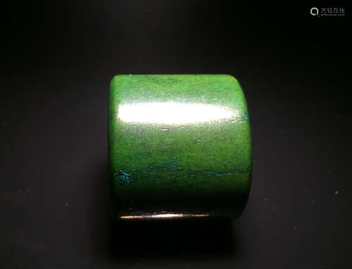 A GREEN WALRUS IVORY THUMB RING