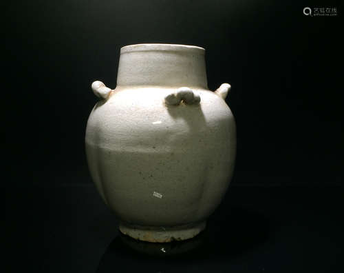 A GREEN GLAZE JAR