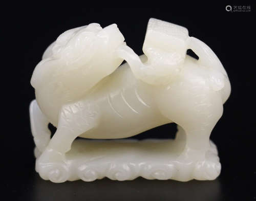 A HETIAN WHITE JADE BEAST CARVED PENDANT