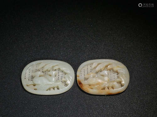 A PAIR OF HETIAN JADE PENDANTS