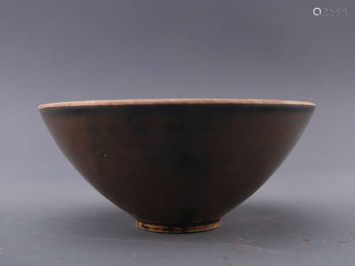 A BROWN-GLAZED BOWL