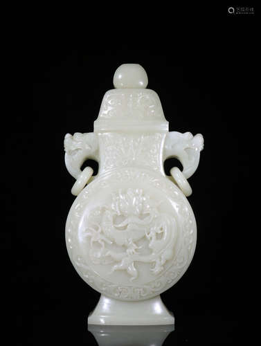 A HETIAN JADE VASE WITH DRAGON PATTERN