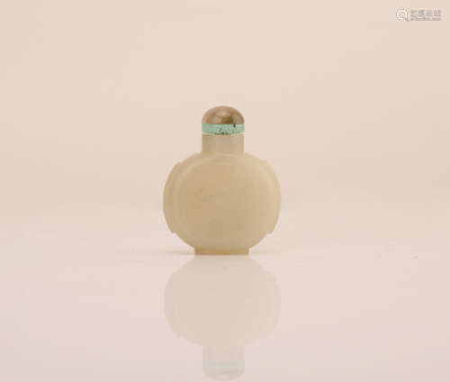 A Chinese Carved Jade Snuff Bottle