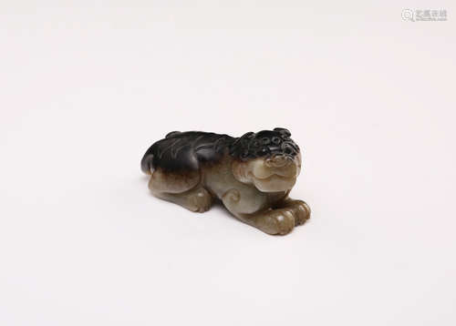 A Chinese Carved Jade Foo-Dog