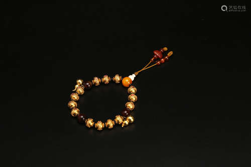 A Chinese Gold Prayer Beads