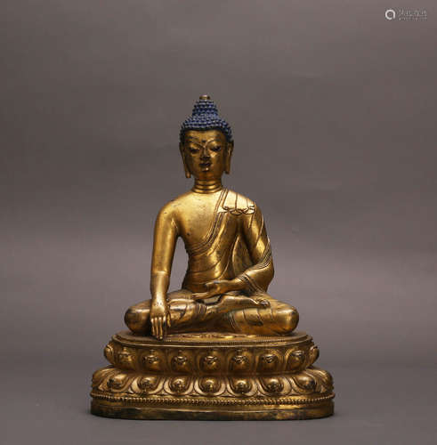 A Chinese Gilt Bronze Buddha