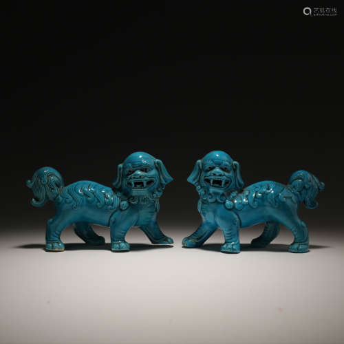 A Pair of Chinese Blue Glazed Porcelain Foo-Dogs