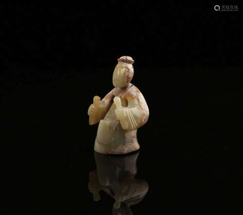 A Chinese Carved Yellow Jade Figure