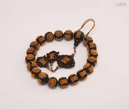 A Chinese Carved Chenxiang Prayer Beads with Gold Inlaid