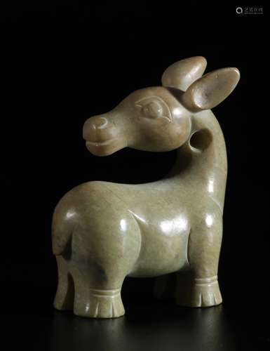 Carved light green jade donkey