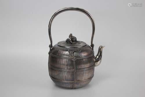 Silver tea pot with mark