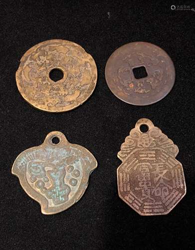 Set of four bronze coins