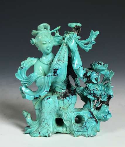 A Finely Carved Turquoise Figure